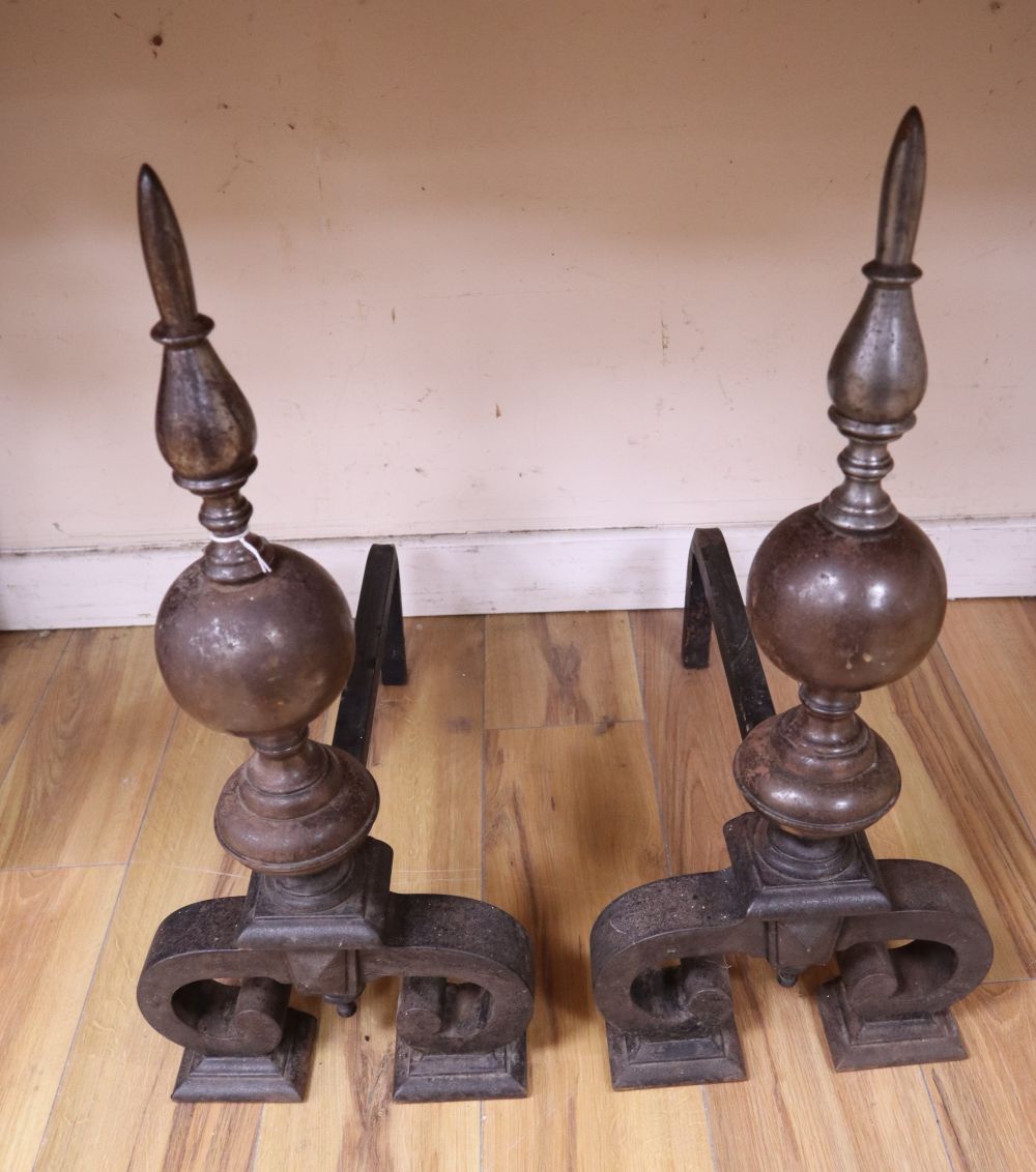 A pair of 17th century style iron andirons, height 64cm